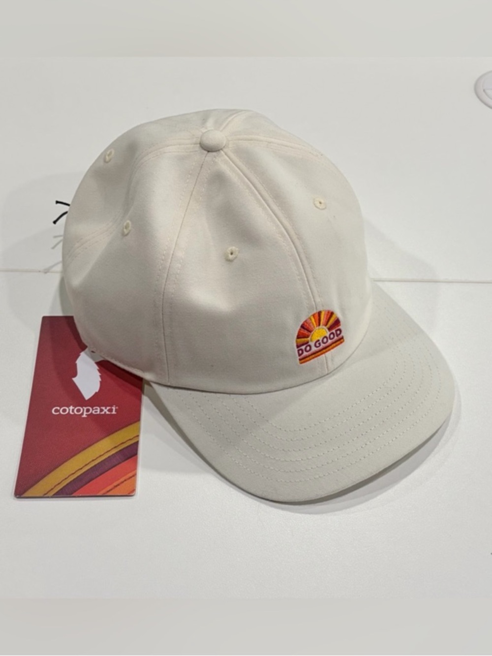 Cotopaxi Sunrise Dad Hat Adult Cap White Cream NWT Curved Brim Adjustable Strap